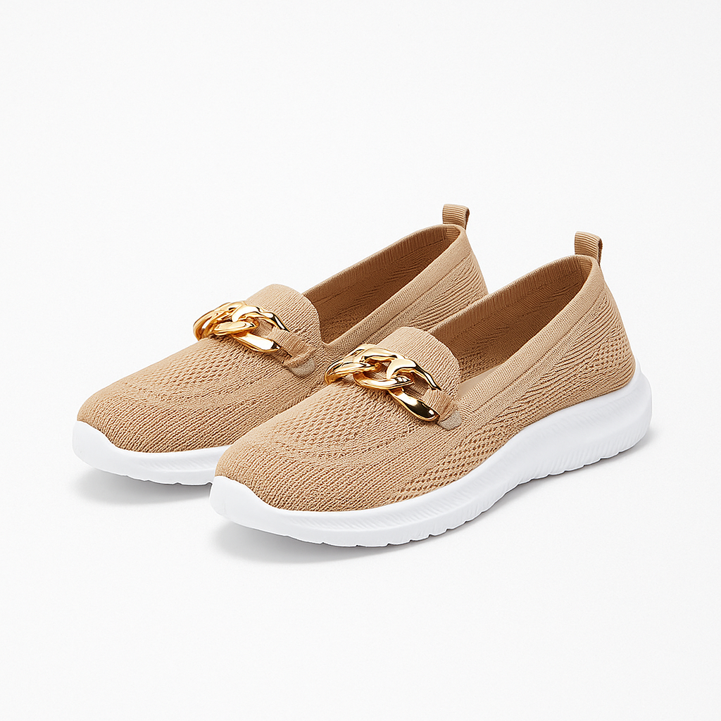 Women's knit shoes featuring a gold chain detail and a white sole. 5