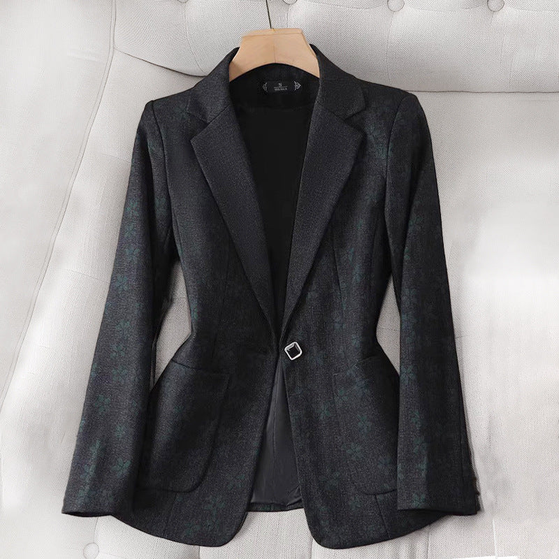 Women's fitted plaid blazer with elegant detailing. 2