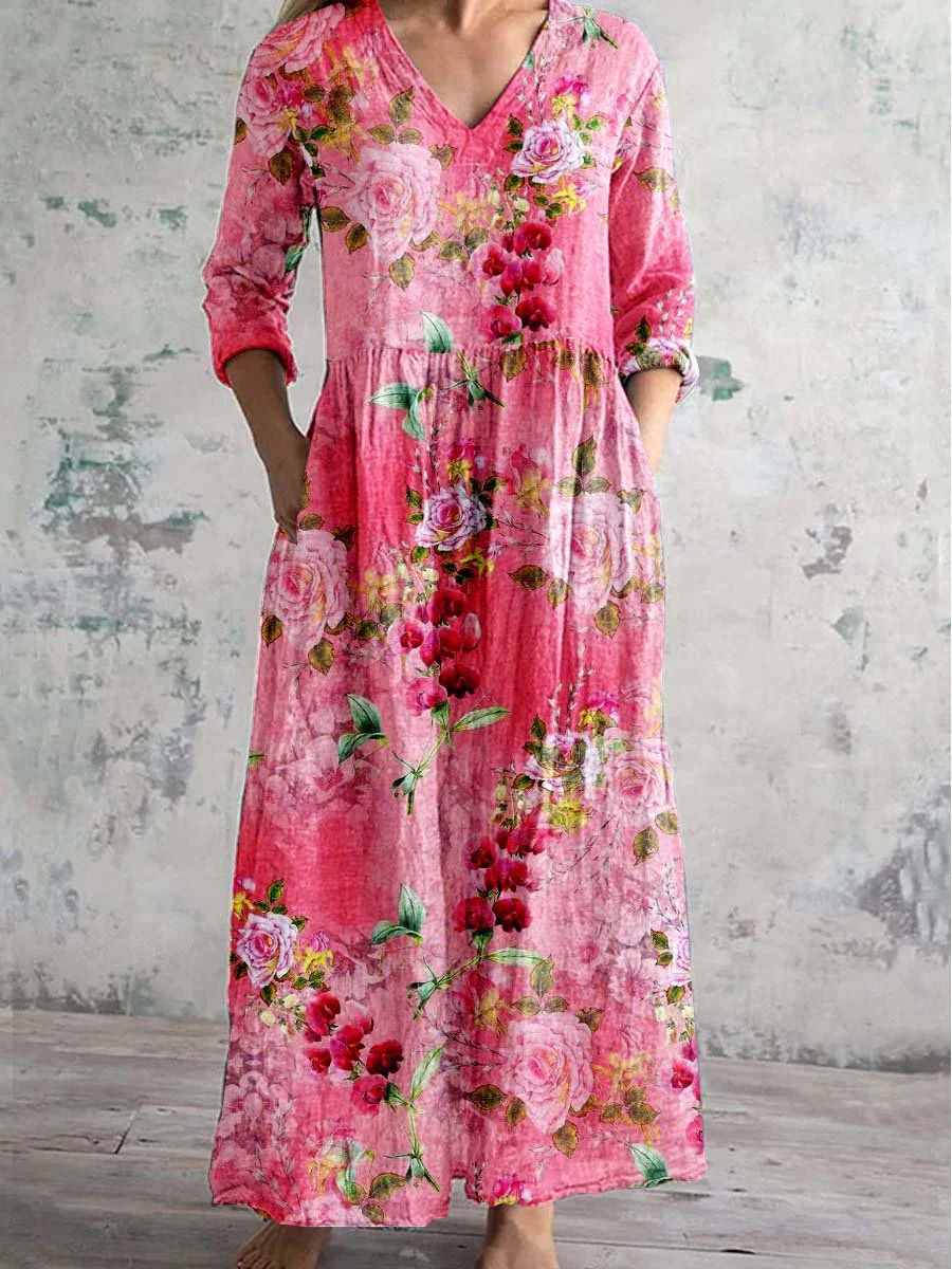 Maxi dress featuring a V-neckline and rolled sleeves, displayed on a mannequin against a neutral background. 5