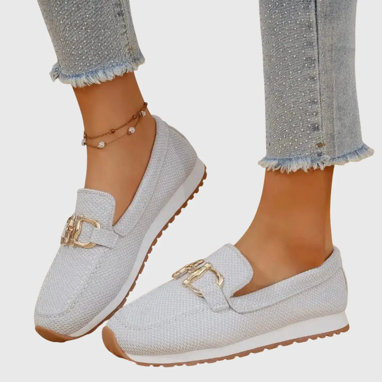 Orthopedic women's moccasins featuring metallic details and a non-slip sole. 8