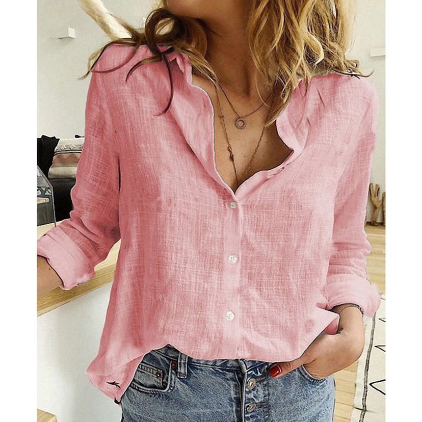 Woman's linen shirt in a relaxed fit with loose sleeves, displayed on a plain background. 4
