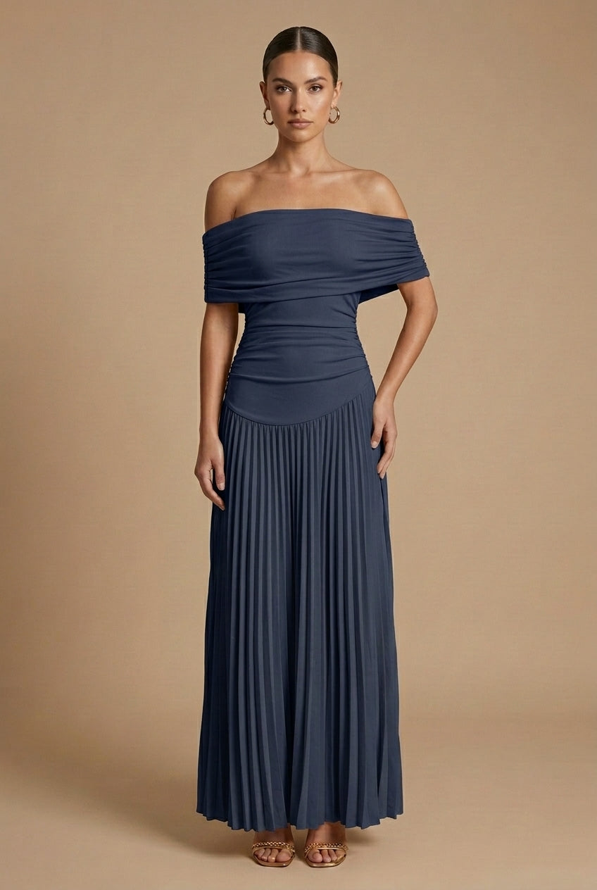 Maxi dress for women featuring off-the-shoulder sleeves and a pleated skirt, displayed on a mannequin. 4
