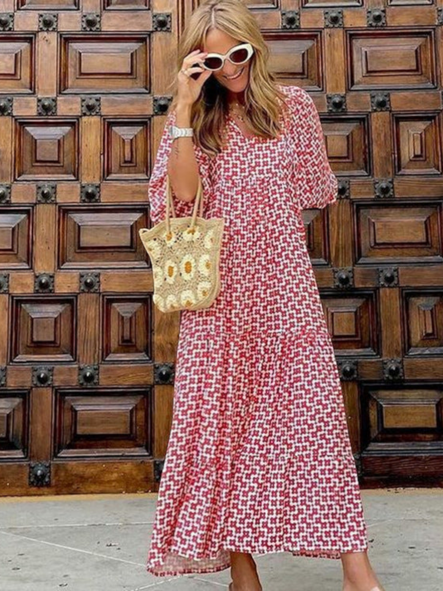 Maxi dress with long sleeves featuring a retro design, suitable for women attending weddings. The dress has a flowing silhouette and a classic pattern. 6