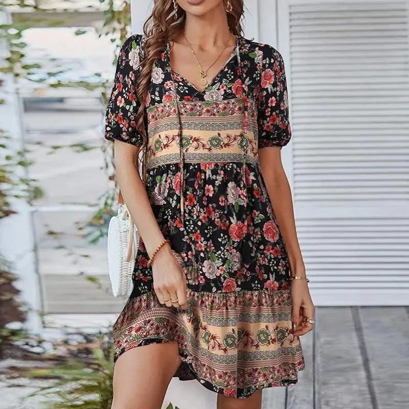 Women's midi dress featuring a V-neck design and a floral pattern, suitable for evening events and weddings. 5