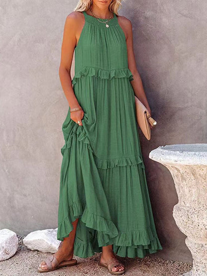 A women's sleeveless A-line dress with ruffles, designed for weddings and summer events. 0