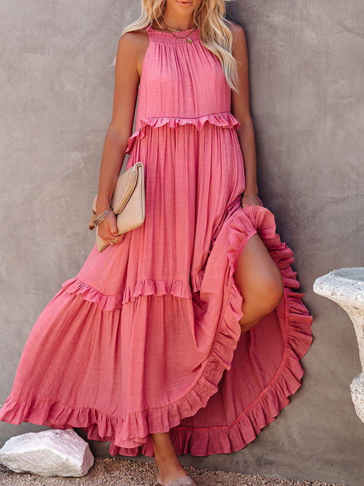 A women's sleeveless A-line dress with ruffles, designed for weddings and summer events. 4