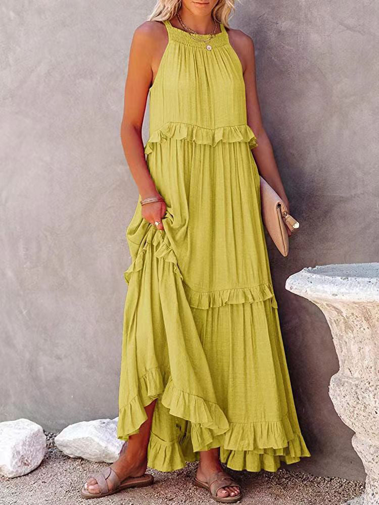 A women's sleeveless A-line dress with ruffles, designed for weddings and summer events. 5
