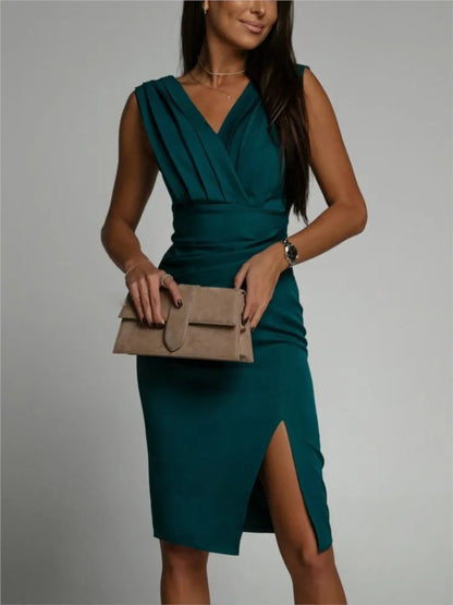 Midi cocktail dress featuring ruching and a thigh-high slit, designed for formal events like weddings. 3