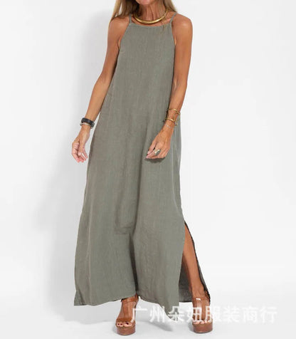 Maxi dress with straps featuring a minimalist design, showcasing a flowing silhouette suitable for summer events and weddings. 1