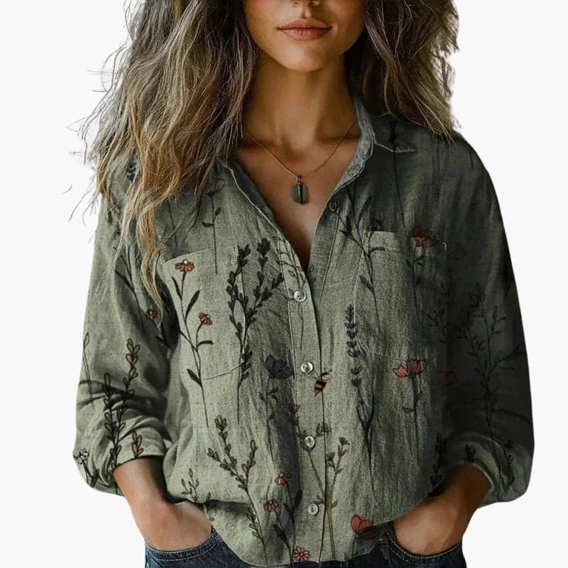 Women's white shirt with a classic collar and long sleeves. 6