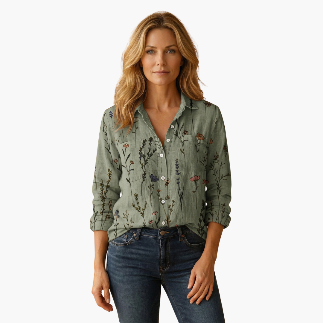 Women's white shirt with a classic collar and long sleeves. 7