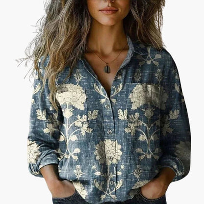 Women's white shirt with a classic collar and long sleeves. 8