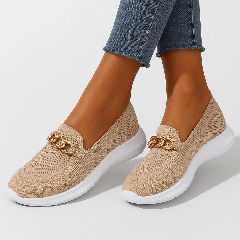 Women's knit shoes featuring a gold chain detail and a white sole. 0