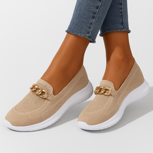 Women's knit shoes featuring a gold chain detail and a white sole. 0