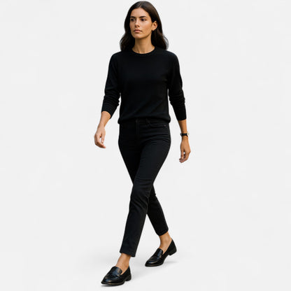 Women's leather loafers featuring a classic design, showcasing a sleek silhouette and minimalistic style. 1