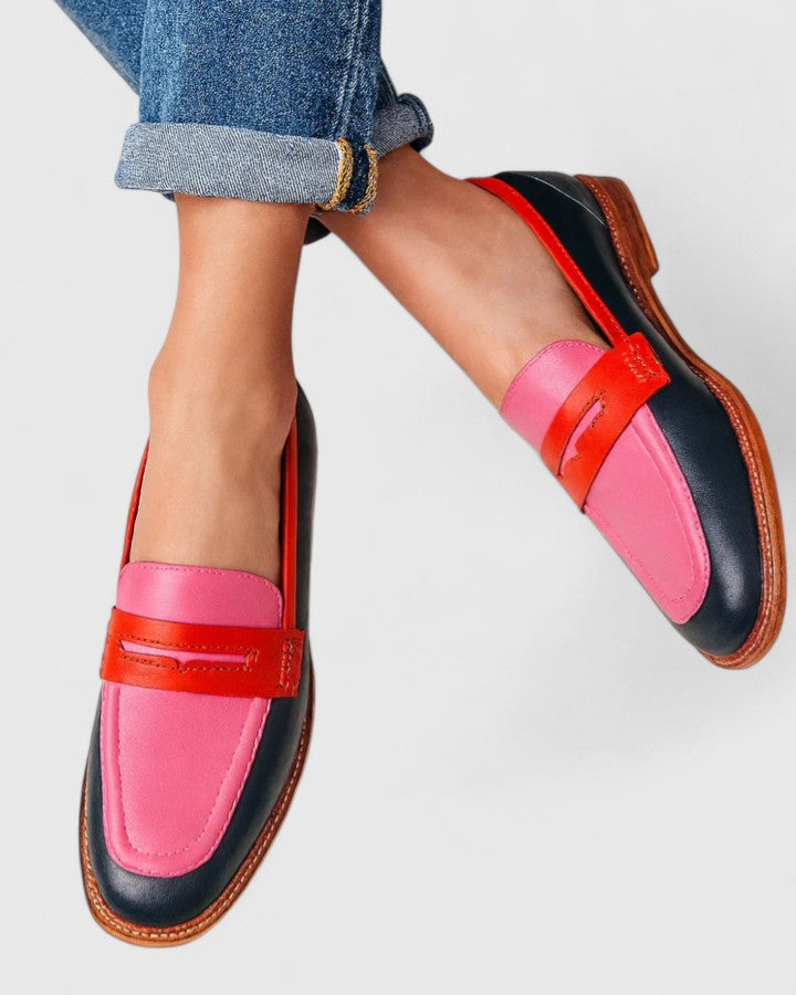 Women's leather loafers with a round toe design, featuring a classic silhouette and a sleek appearance. 0
