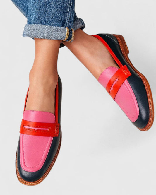 Women's leather loafers with a round toe design, featuring a classic silhouette and a sleek appearance. 0