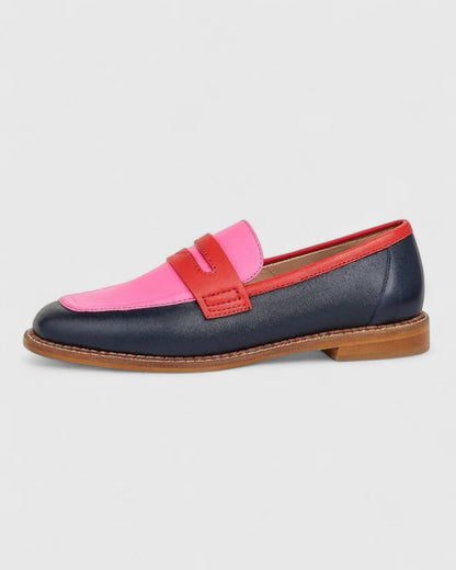 Women's leather loafers with a round toe design, featuring a classic silhouette and a sleek appearance. 1