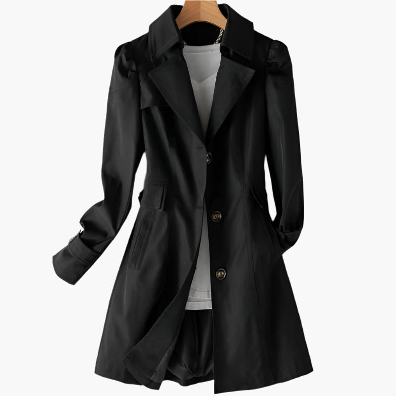 Long black women's trench coat featuring a classic design with buttons, suitable for spring and winter wear. 1