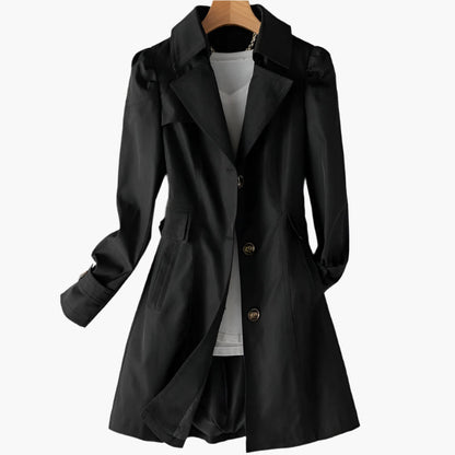 Long black women's trench coat featuring a classic design with buttons, suitable for spring and winter wear. 1