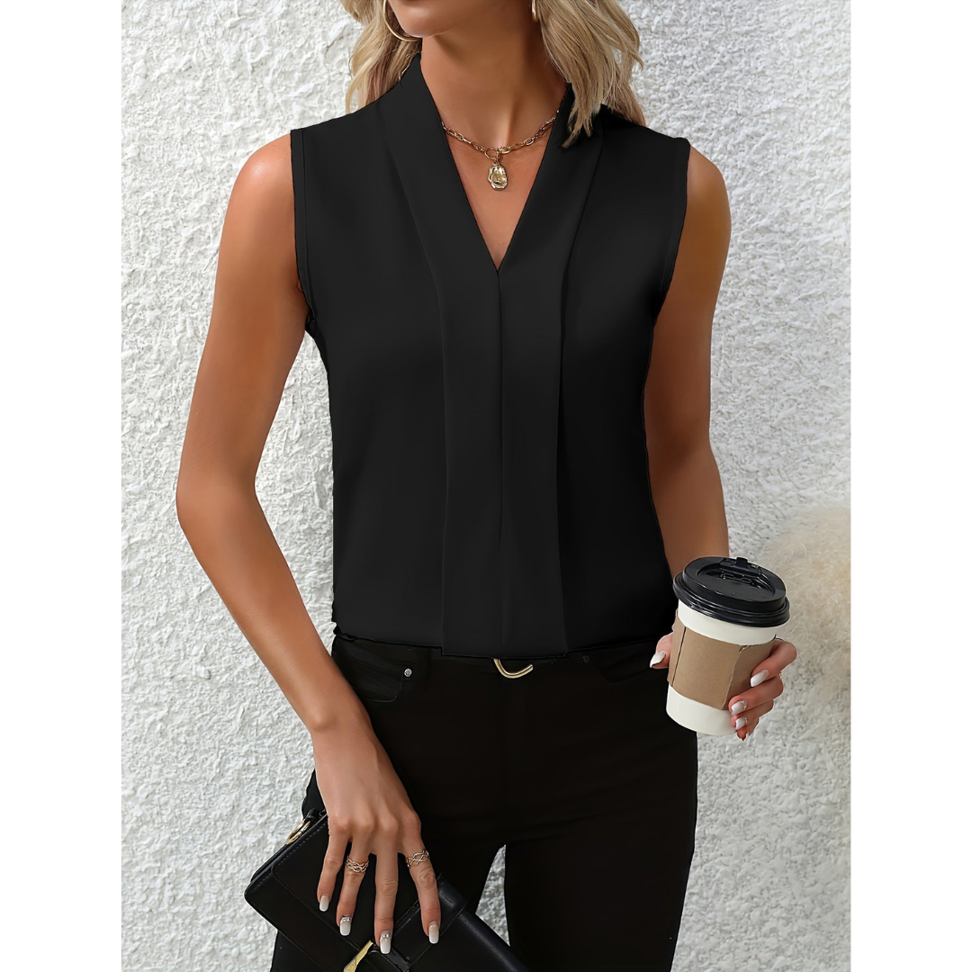 Woman's sleeveless blouse with a V-shaped neckline. 1