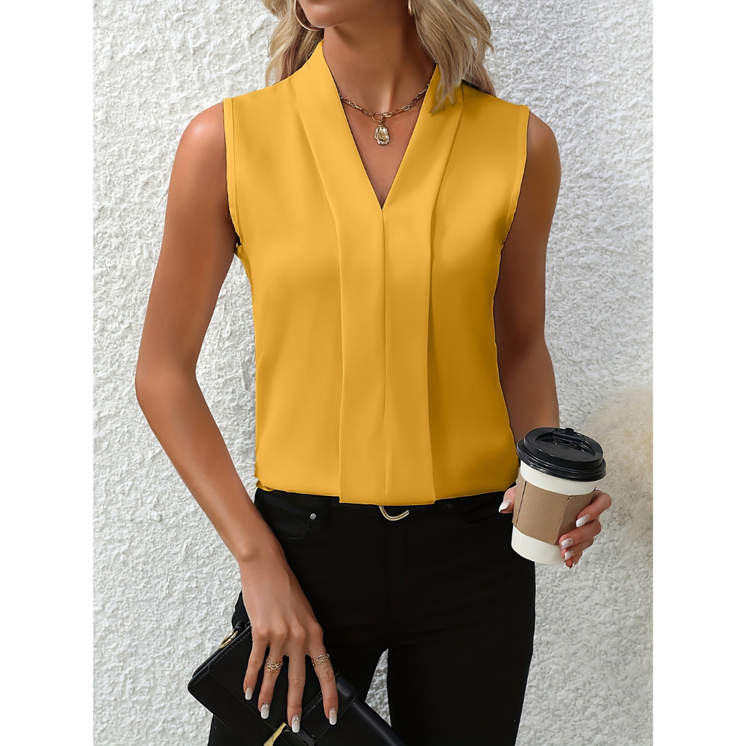 Woman's sleeveless blouse with a V-shaped neckline. 2
