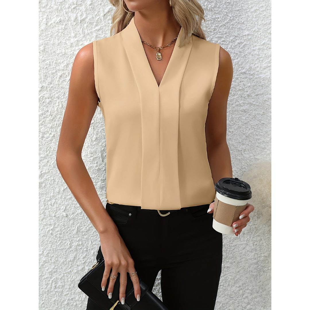 Woman's sleeveless blouse with a V-shaped neckline. 3
