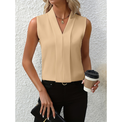 Woman's sleeveless blouse with a V-shaped neckline. 3