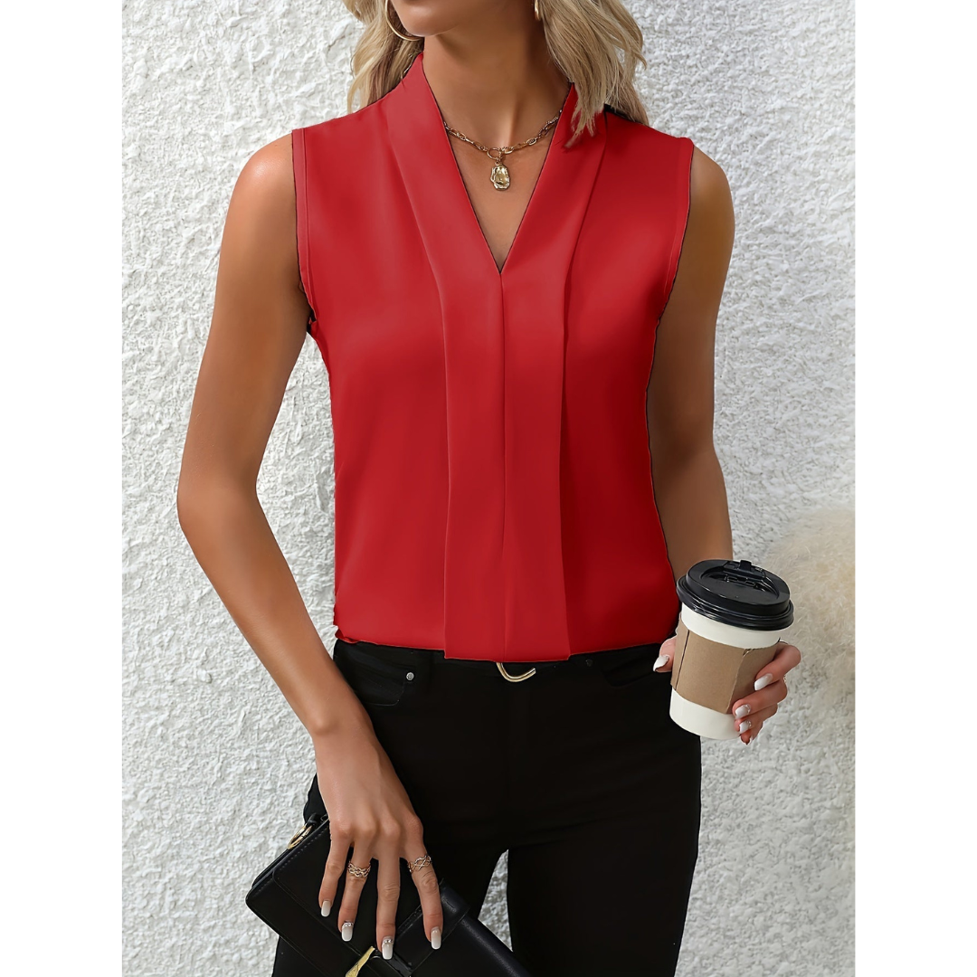 Woman's sleeveless blouse with a V-shaped neckline. 4