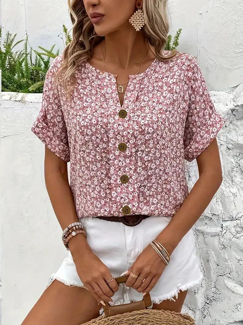 Long-sleeve women's blouse featuring a floral pattern, designed with a button-down front and a classic collar. 0