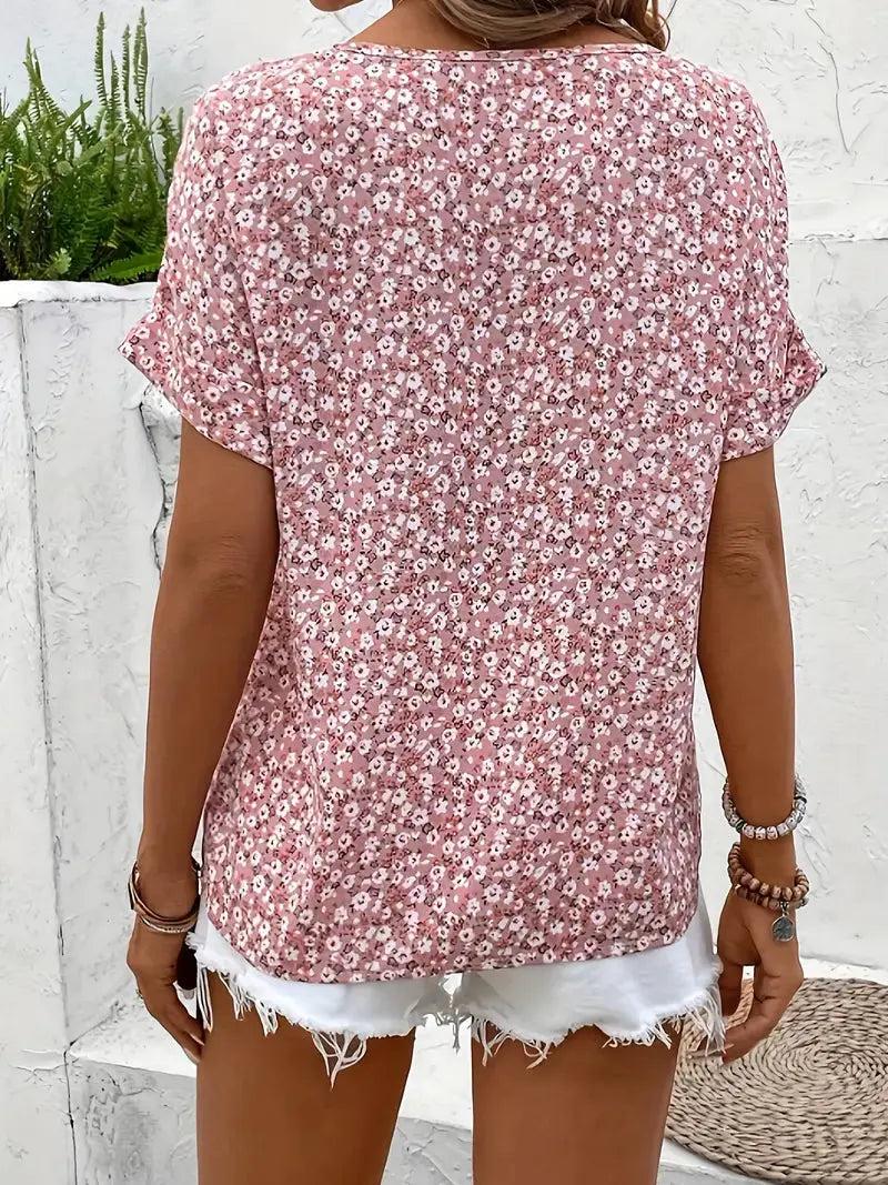 Long-sleeve women's blouse featuring a floral pattern, designed with a button-down front and a classic collar. 2