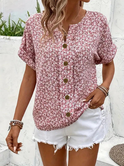 Long-sleeve women's blouse featuring a floral pattern, designed with a button-down front and a classic collar. 3