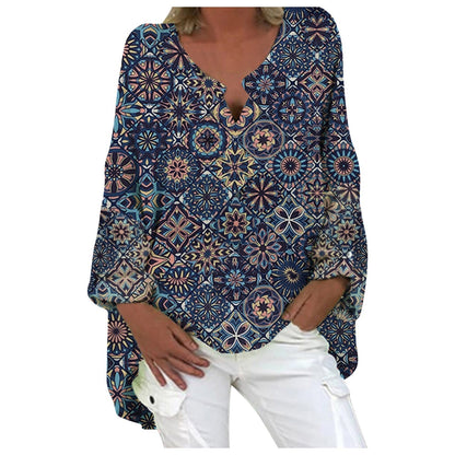 A women's summer blouse featuring a feminine cut, displayed on a mannequin in a simple setting. 1