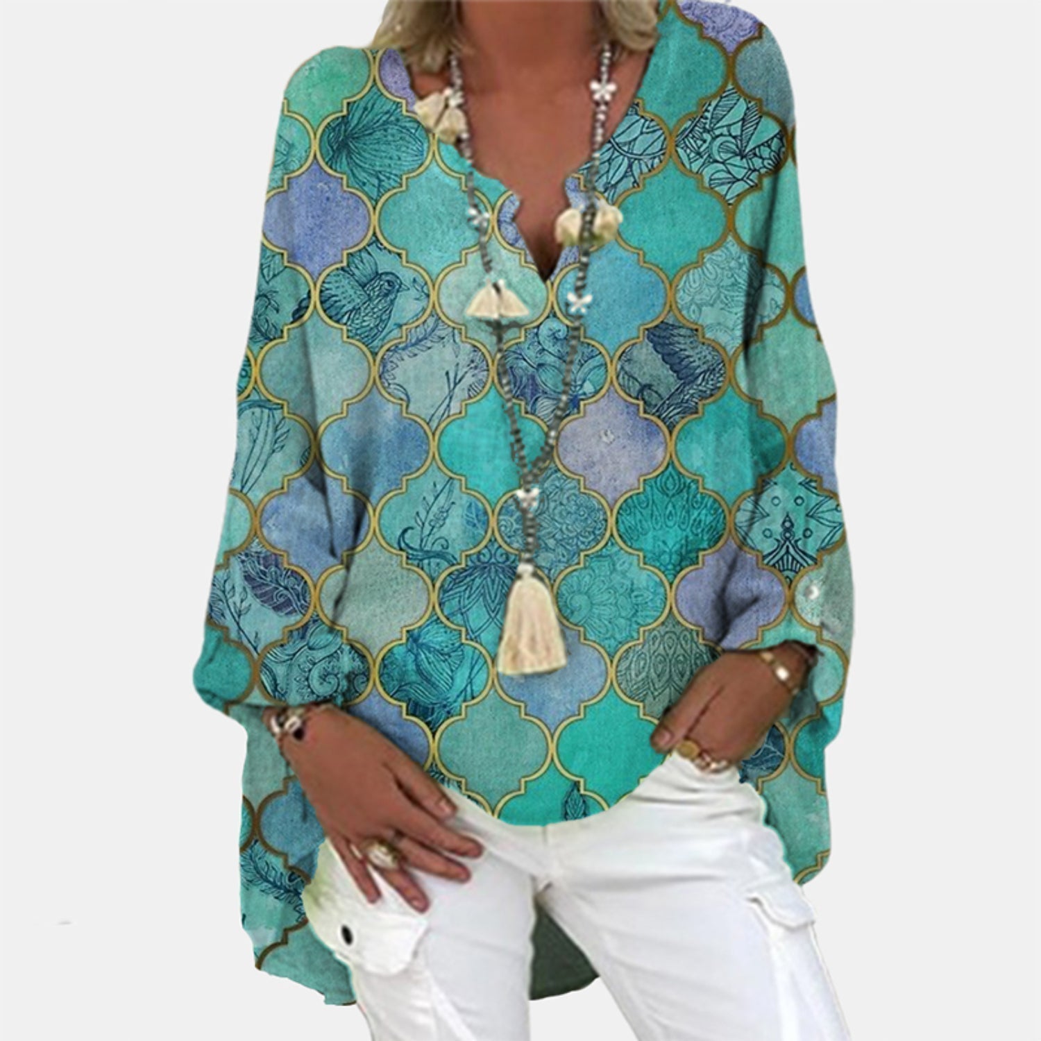 A women's summer blouse featuring a feminine cut, displayed on a mannequin in a simple setting. 3