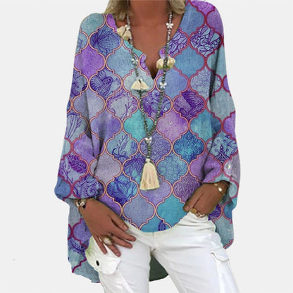 A women's summer blouse featuring a feminine cut, displayed on a mannequin in a simple setting. 6