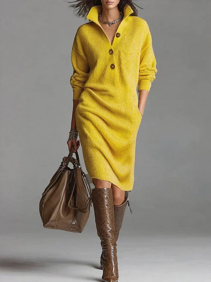 A midi dress featuring a ribbed texture and button closure, designed for women. 0
