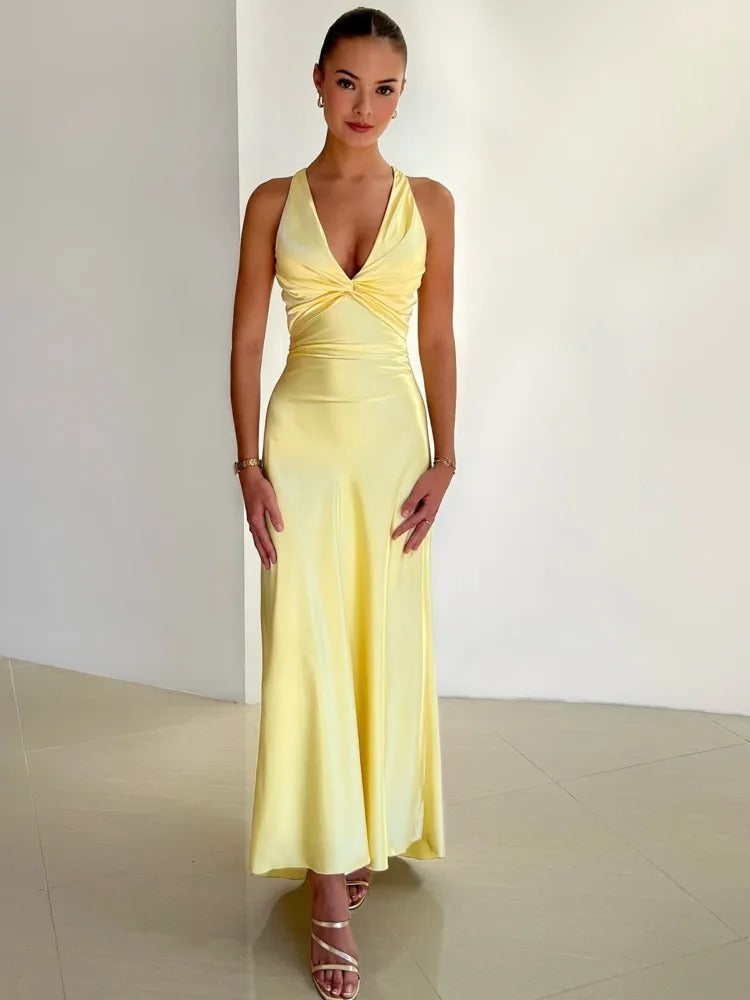 Maxi evening dress with a halter neckline and gathered detailing. 0