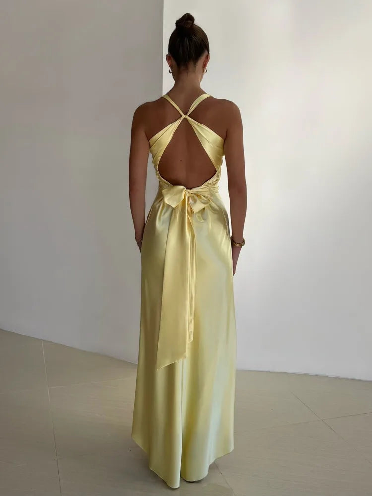 Maxi evening dress with a halter neckline and gathered detailing. 1