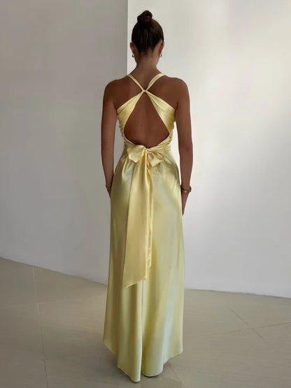 Maxi evening dress with a halter neckline and gathered detailing. 1