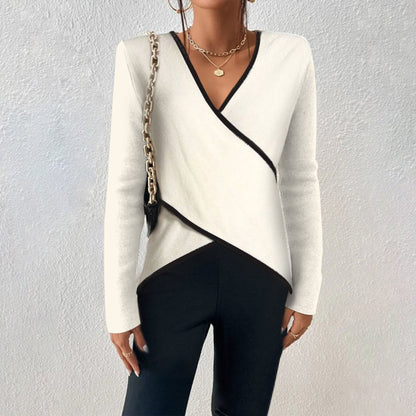 Women's long-sleeve blouse tied at the front, featuring a fitted design and a classic collar. 0
