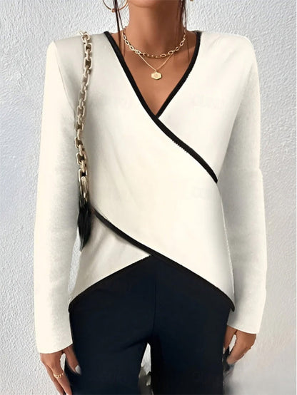 Women's long-sleeve blouse tied at the front, featuring a fitted design and a classic collar. 5