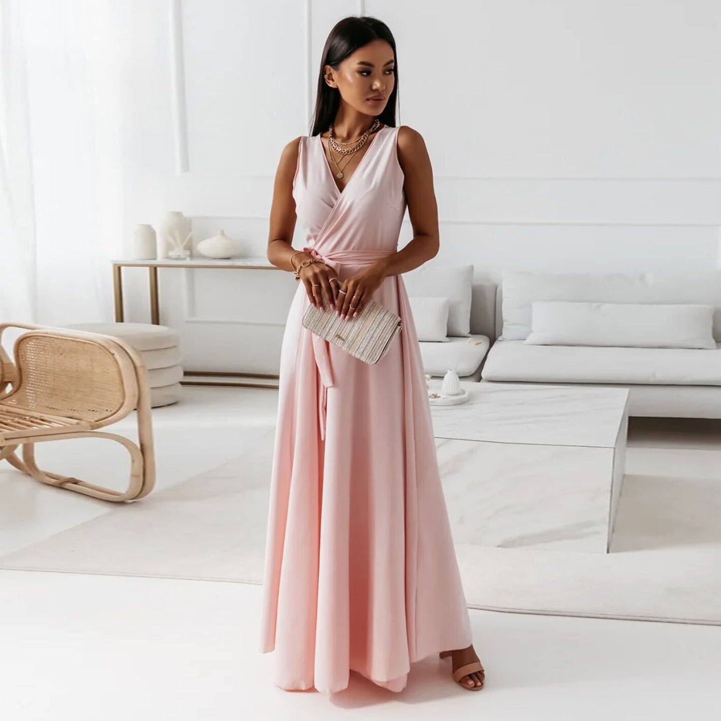 Long-sleeve maxi dress with a wrap design, featuring a flowing silhouette and a modest neckline. 0