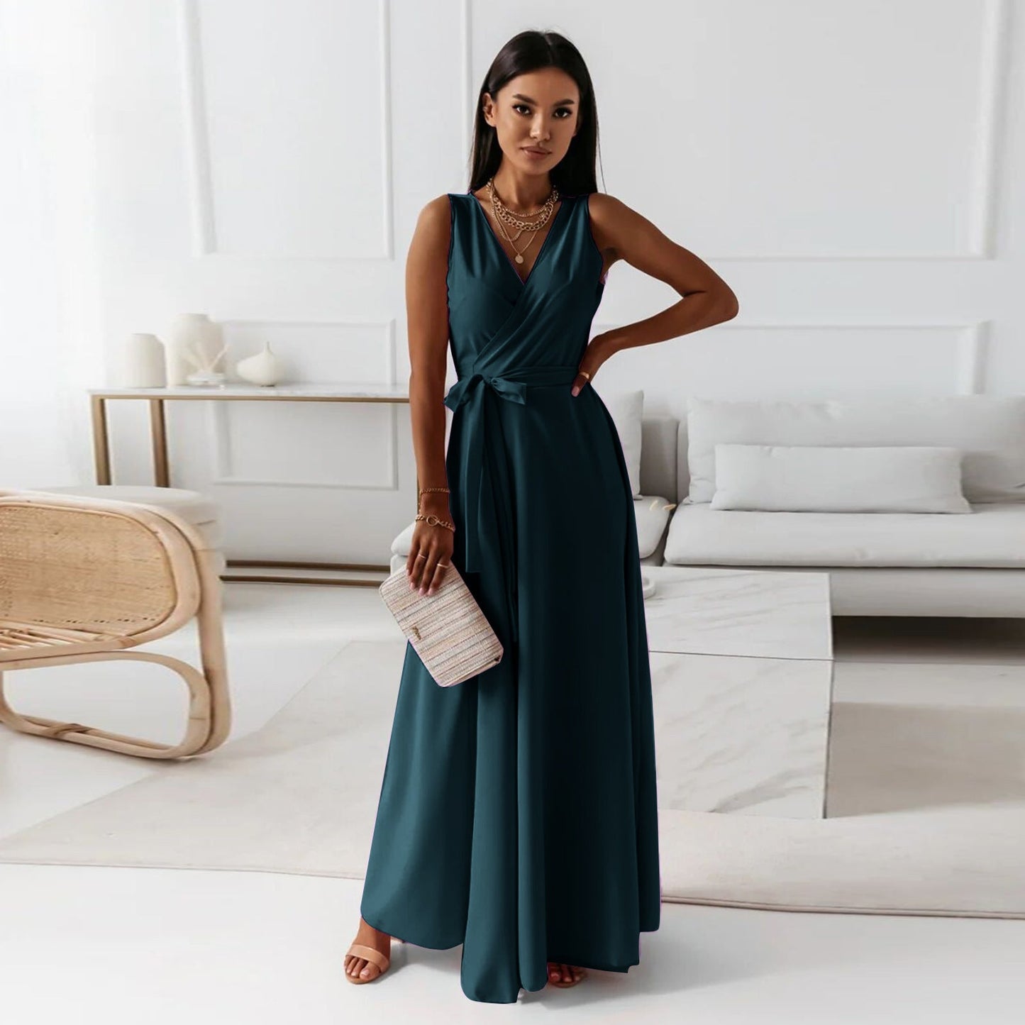Long-sleeve maxi dress with a wrap design, featuring a flowing silhouette and a modest neckline. 1