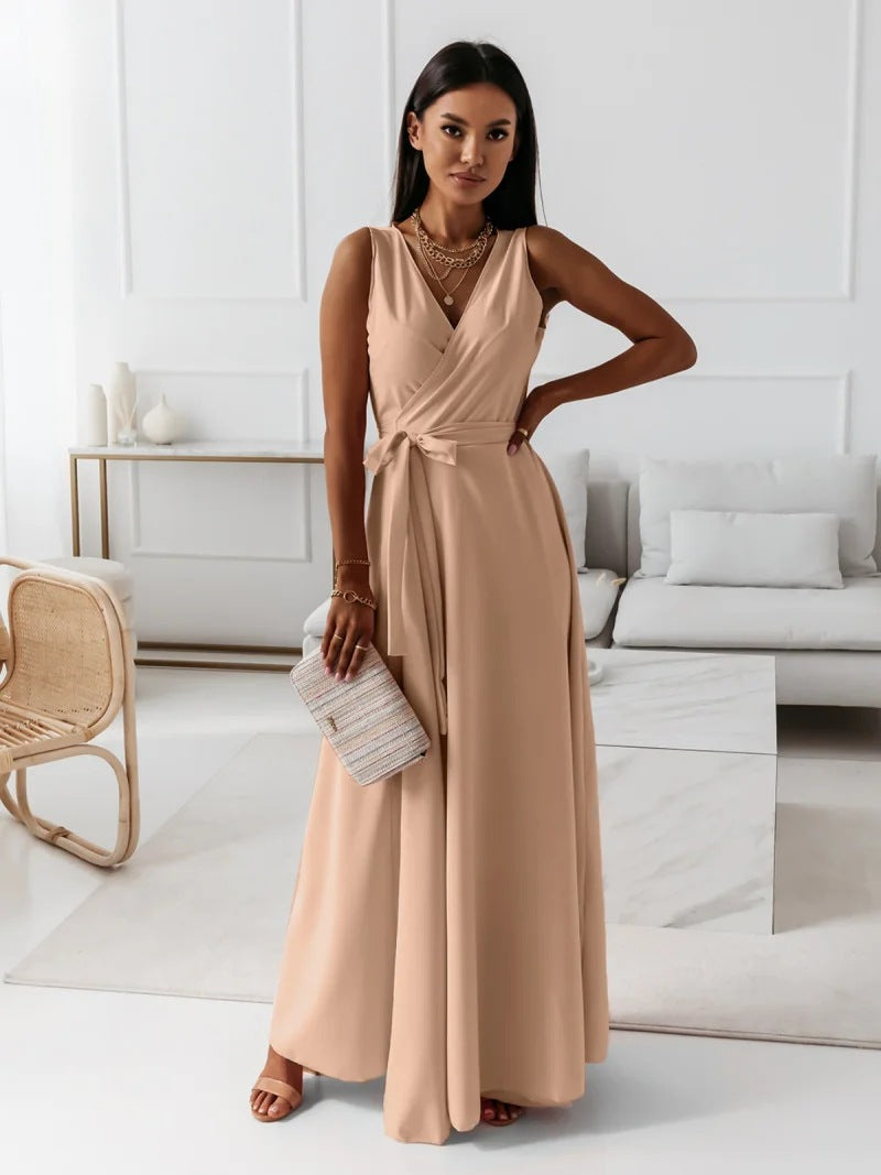 Long-sleeve maxi dress with a wrap design, featuring a flowing silhouette and a modest neckline. 4