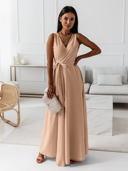 Long-sleeve maxi dress with a wrap design, featuring a flowing silhouette and a modest neckline. 4