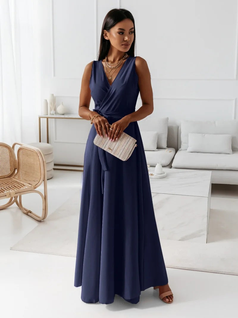 Long-sleeve maxi dress with a wrap design, featuring a flowing silhouette and a modest neckline. 5