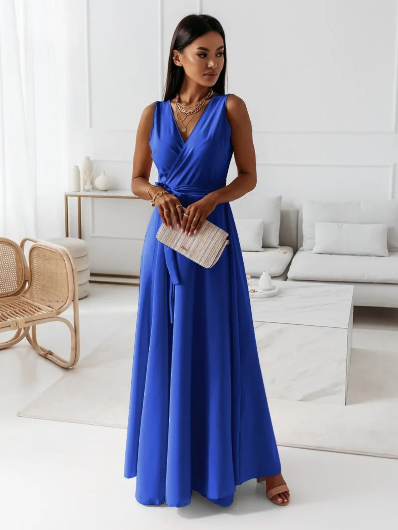 Long-sleeve maxi dress with a wrap design, featuring a flowing silhouette and a modest neckline. 6