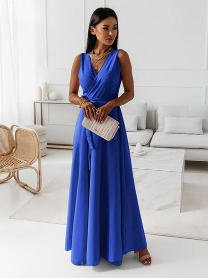 Long-sleeve maxi dress with a wrap design, featuring a flowing silhouette and a modest neckline. 6