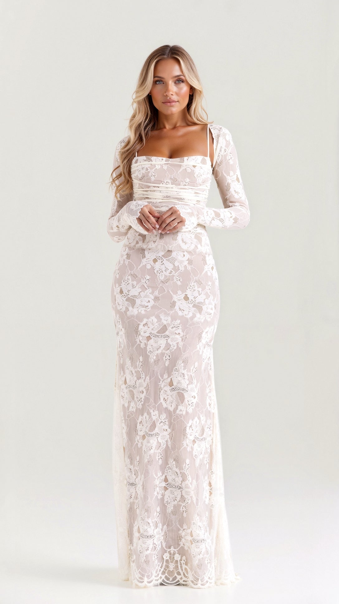 A long, floral-patterned dress with a corset-style bodice, designed for formal events such as weddings. The dress features lace details and a 0