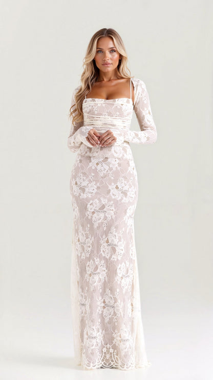 A long, floral-patterned dress with a corset-style bodice, designed for formal events such as weddings. The dress features lace details and a 0